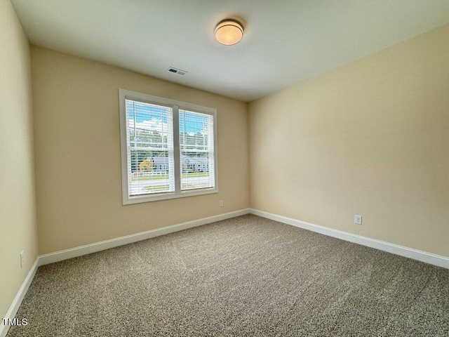 1005 Sunnybrook Rd S, Wilson, NC 27893 - carpeted spare room featuring baseboards