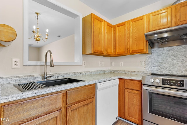 kitchen with stainless steel range oven, sink, a notable chandelier, white dishwasher, and range hood