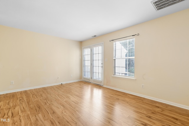 empty room with light wood-type flooring