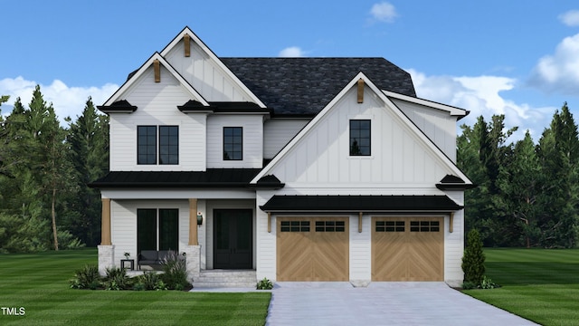 modern farmhouse featuring a garage and a front lawn