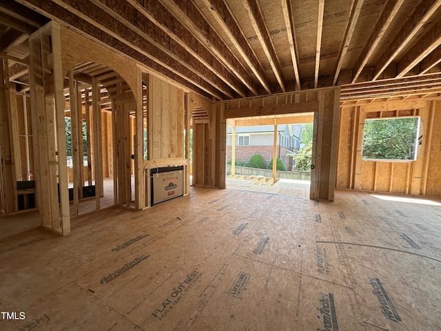 208 E Whitaker Mill Rd, Raleigh, NC 27608 - unfurnished living room with arched walkways