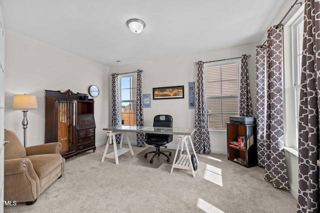 home office with light colored carpet