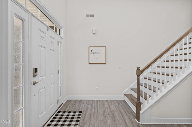 entrance foyer featuring light hardwood / wood-style floors