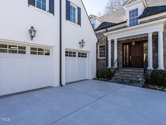 entrance to property featuring a garage