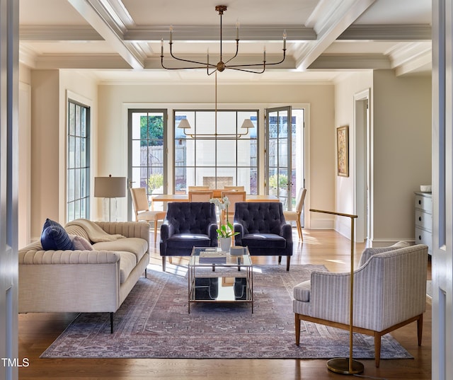 1307 Mayfair Rd, Raleigh, NC 27608 - living room featuring a chandelier, crown molding, coffered ceiling, beam ceiling, and healthy amount of natural light