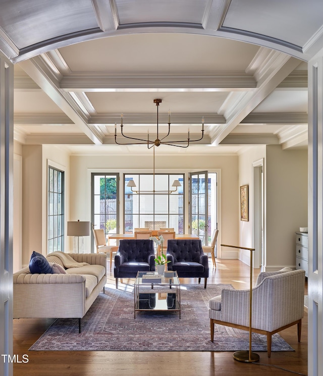 1307 Mayfair Rd, Raleigh, NC 27608 - living area with crown molding, healthy amount of natural light, coffered ceiling, wood finished floors, and beamed ceiling