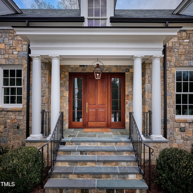 1307 Mayfair Rd, Raleigh, NC 27608 - entrance to property with stone siding and a porch