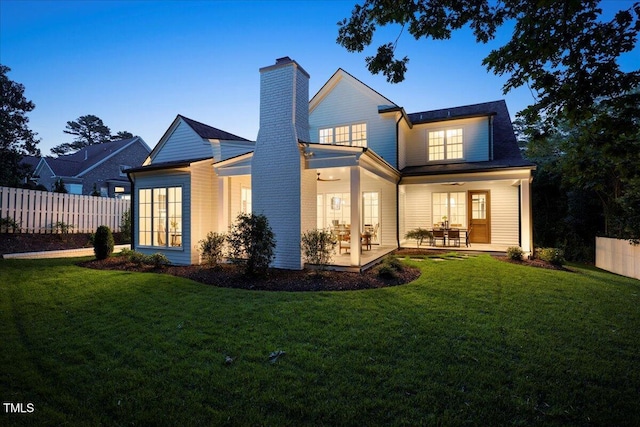 1307 Mayfair Rd, Raleigh, NC 27608 - back of house with ceiling fan, a chimney, and a patio