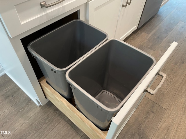 details featuring white cabinets and dark hardwood / wood-style flooring