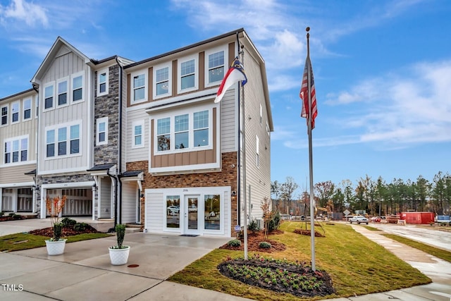 townhome / multi-family property with french doors