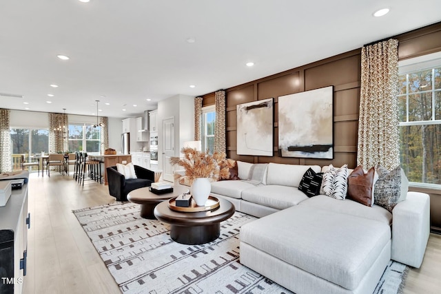 living room with light hardwood / wood-style floors