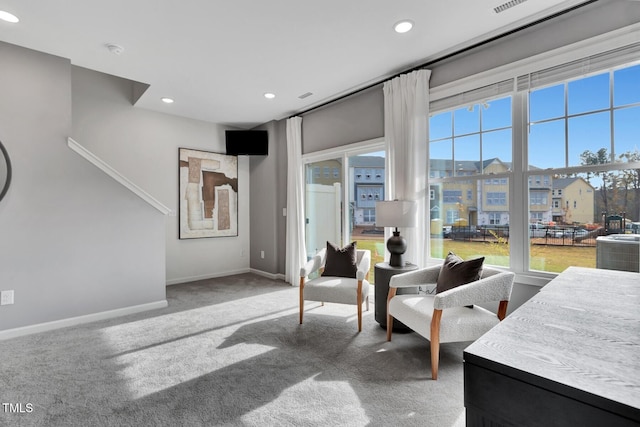 living room featuring carpet flooring