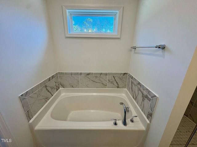 bathroom with a bath