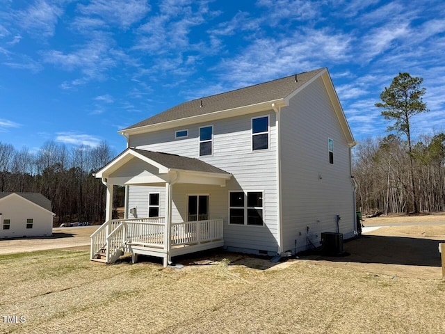 back of property featuring crawl space and central air condition unit