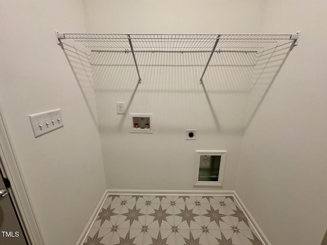 235 Grand Griffon Way, Lillington, NC 27546 - laundry area featuring baseboards, hookup for a washing machine, electric dryer hookup, and tile patterned floors
