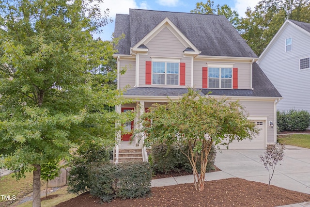 craftsman-style home with a garage