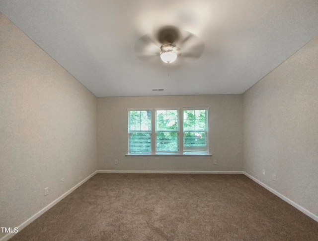 carpeted empty room with ceiling fan