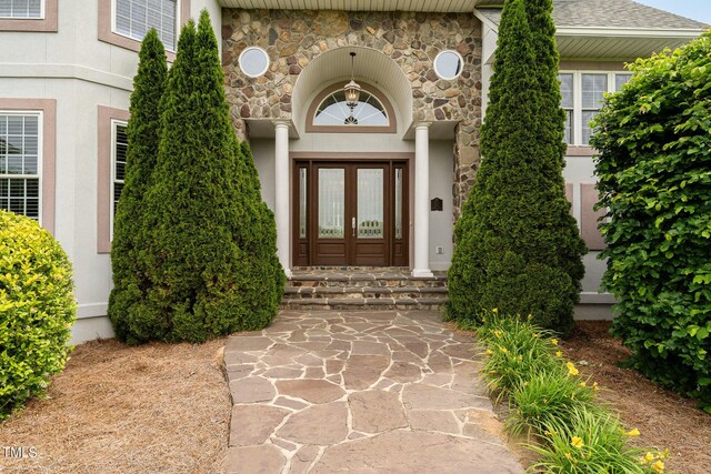 doorway to property featuring french doors