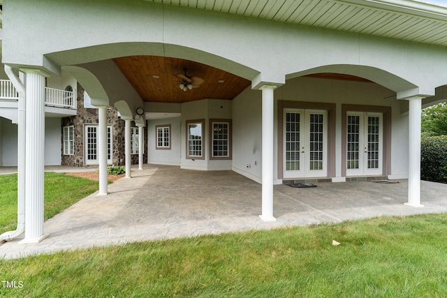 exterior space featuring ceiling fan