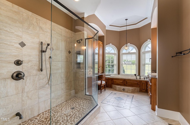 bathroom with tile patterned floors, ornamental molding, and independent shower and bath
