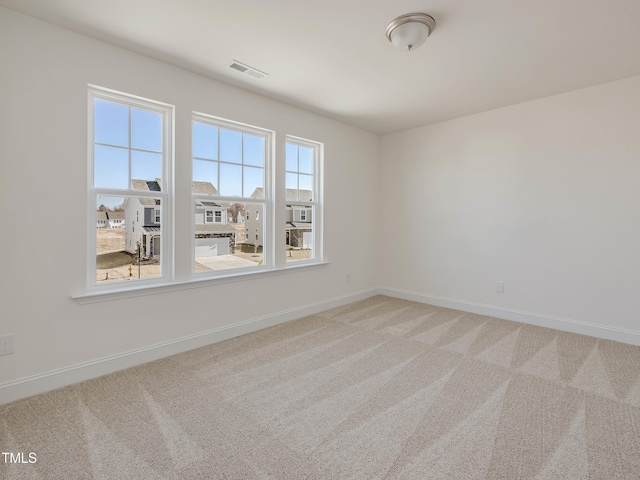 view of carpeted spare room