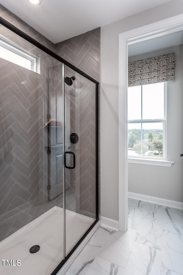 bathroom with an enclosed shower