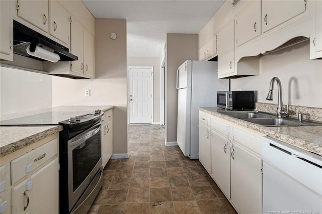 kitchen with white cabinets, sink, and appliances with stainless steel finishes