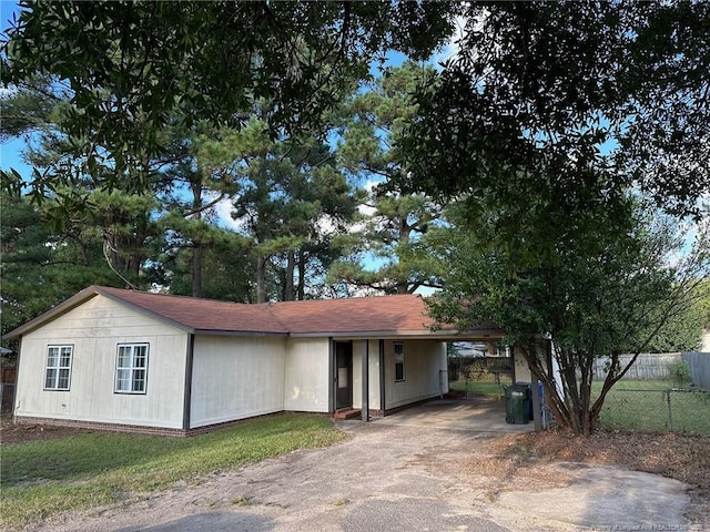 view of front of property with a carport