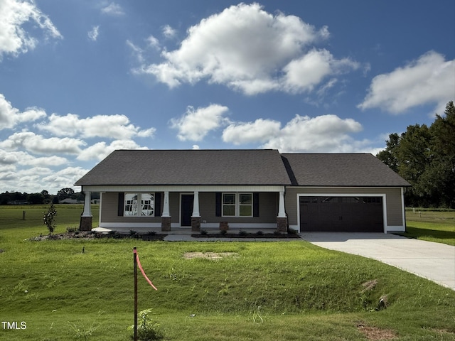 139 Grace Ridge Ct, Benson, NC 27504 - view of front of house featuring a garage, driveway, and a front lawn