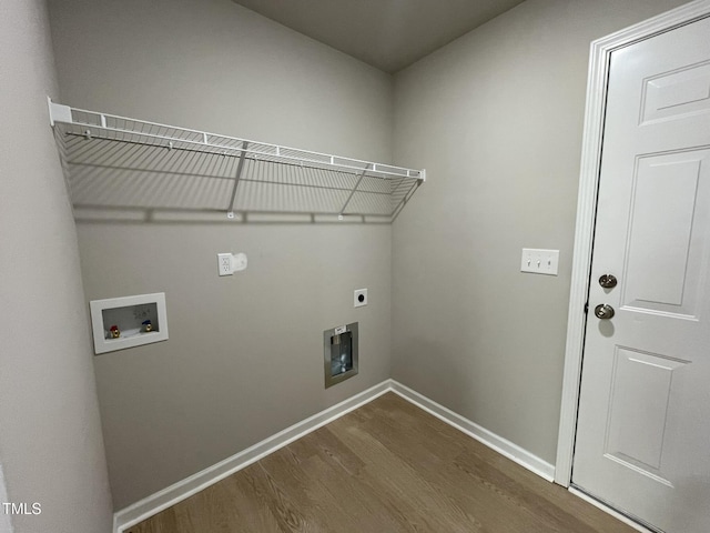 53 Grace Ridge Ct, Benson, NC 27504 - clothes washing area featuring dark wood-style flooring, laundry area, hookup for a washing machine, baseboards, and hookup for an electric dryer