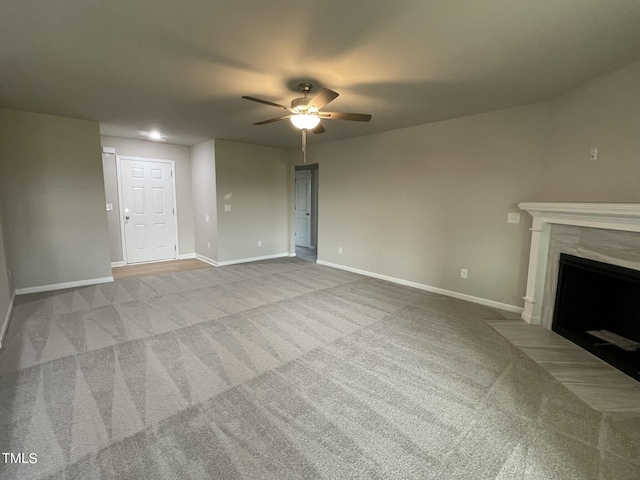 53 Grace Ridge Ct, Benson, NC 27504 - unfurnished living room featuring baseboards, ceiling fan, and carpet