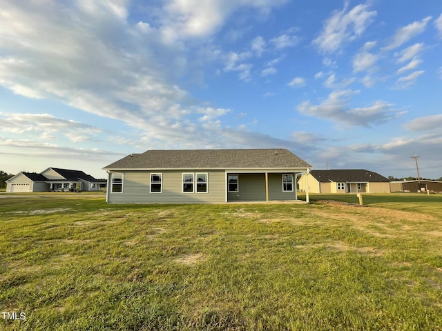 53 Grace Ridge Ct, Benson, NC 27504 - back of house with a lawn