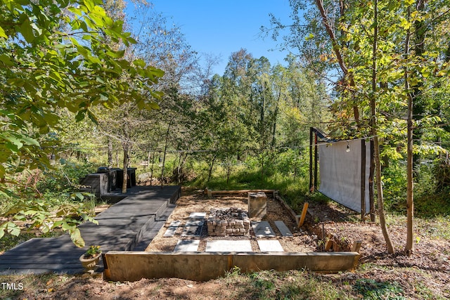 view of yard featuring a deck