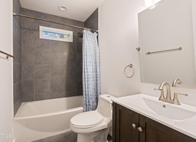 full bathroom with vanity, tile patterned floors, toilet, and shower / bath combo