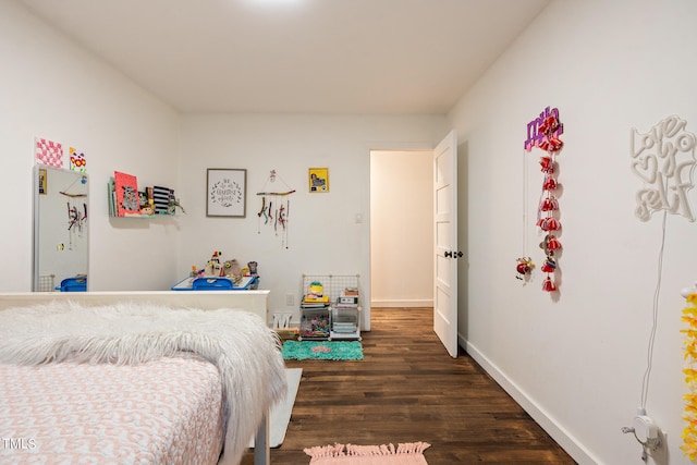 bedroom featuring dark hardwood / wood-style floors