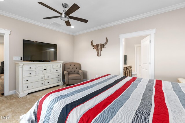 carpeted bedroom with ceiling fan, ensuite bath, and crown molding