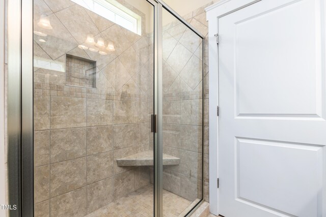 bathroom featuring walk in shower