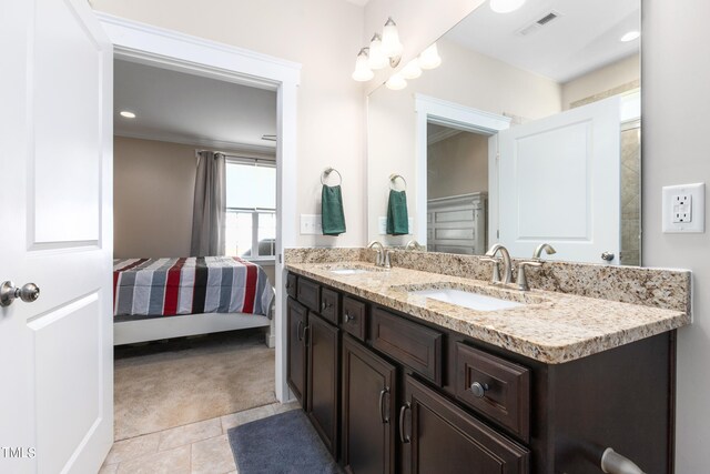 bathroom featuring vanity and tile patterned floors