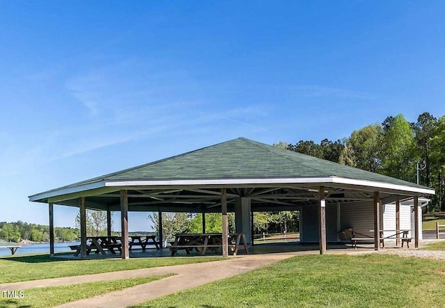 surrounding community with a gazebo and a lawn