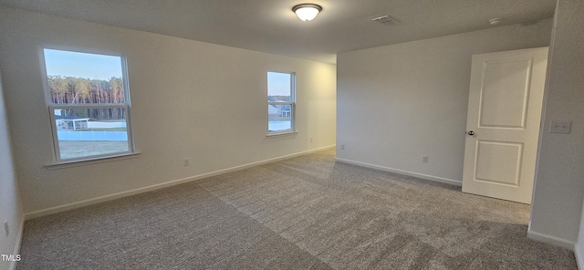 spare room with carpet flooring