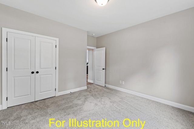 unfurnished bedroom featuring light colored carpet and a closet