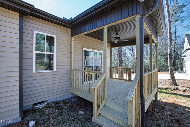 wooden deck with ceiling fan