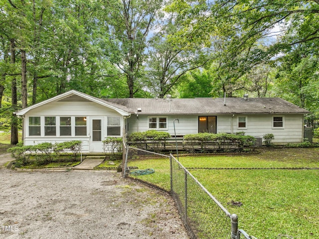 ranch-style house with a front yard