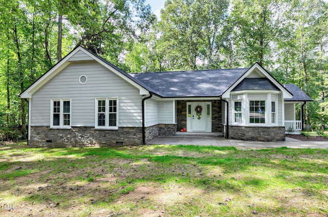 116 Oak Ridge Dr, Willow Springs, NC 27592 - view of front of property with stone siding, crawl space, a front lawn, a shingled roof, and a porch