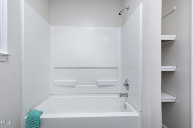 bathroom with shower / washtub combination