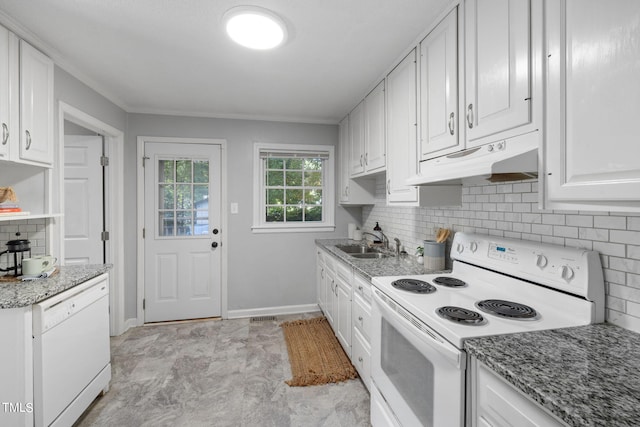 kitchen with light stone counters, tasteful backsplash, white appliances, and white cabinetry