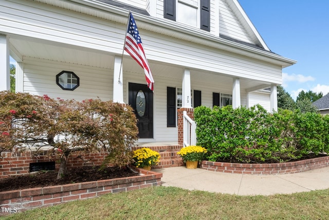 exterior space featuring covered porch