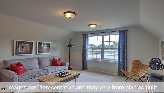 living room with lofted ceiling and carpet