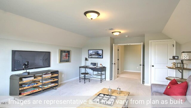 living room featuring light carpet and vaulted ceiling