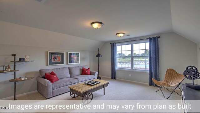 carpeted living room featuring lofted ceiling